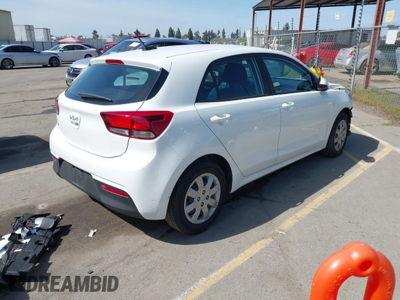 2023 Kia Rio S with VIN 3KPA25AD0PE629868, listed as a IAAI auction lot 41738952 with 25,642 mi miles and . Bid and sale history available at DreamBid. Image 4.