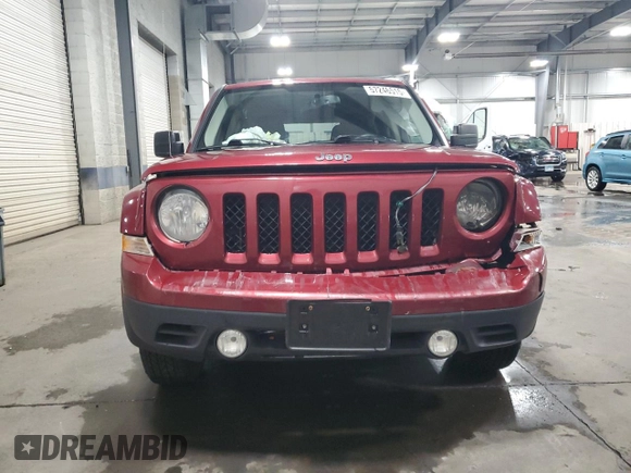 2014 Jeep Patriot Latitude with VIN 1C4NJRFB7ED855780, listed as a Copart auction lot 57246515 with 110,433 mi miles and Salvage title. Bid and sale history available at DreamBid. Image 5.