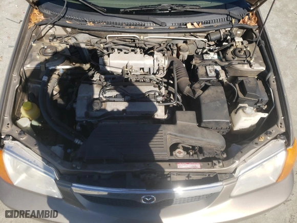 2000 Mazda Protege DX with VIN JM1BJ2227Y0247785, listed as a Copart auction lot 43501105 with 214,380 mi miles and Salvage Title. Bid and sale history available at carsss.com. Image 11.