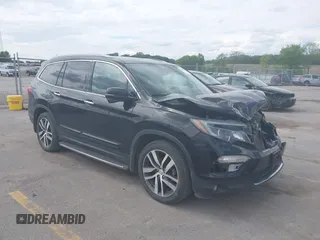 2017 Honda Pilot Touring with VIN 5FNYF6H91HB089288, listed as a IAAI auction lot 42364628 with 191,602 mi miles and . Bid and sale history available at DreamBid. Image 1.