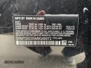 2021 BMW X3 M with VIN 5YMTS0C05M9G46973, listed as a IAAI auction lot 41334083 with 42,819 mi miles. Bid and sale history available at carsss.com. Image 8.