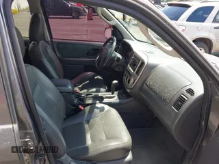 2006 Ford Escape Hybrid z VIN 1FMCU96H86KA52519, wystawiony jako IAAI lot #42443003 z przebiegiem 162 469 mil mil oraz . Historia ofert i sprzedaży dostępna na DreamBid. Obrazek 5.
