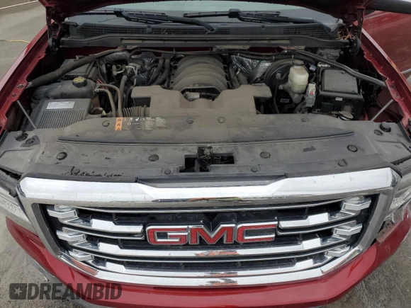 2018 GMC Sierra 1500 SLT z VIN 3GTU2NEC7JG198150, wystawiony jako Copart lot #83103454 z przebiegiem 84 450 mil mil oraz Nie do naprawy • Non repairable. Historia ofert i sprzedaży dostępna na DreamBid. Obrazek 11.