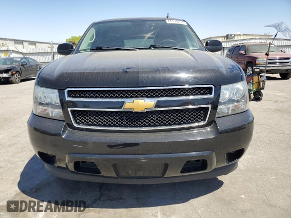 2014 Chevrolet Suburban LS with VIN 1GNSCHE03ER132039, listed as a Copart auction lot 68390234 with 129,744 mi miles and Salvage Title. Bid and sale history available at carsss.com. Image 5.