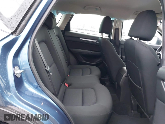 2019 Mazda CX-5 Sport with VIN JM3KFBBM5K0668678, listed as a IAAI auction lot 41811146 with 102,634 mi miles and . Bid and sale history available at DreamBid. Image 8.