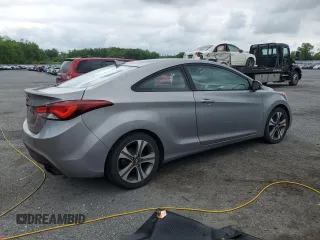 2014 Hyundai Elantra z VIN KMHDH6AH5EU023898, wystawiony jako Copart lot #57201485 z przebiegiem 115 101 mil mil oraz Szkoda całkowita • Salvage title. Historia ofert i sprzedaży dostępna na DreamBid. Obrazek 3.
