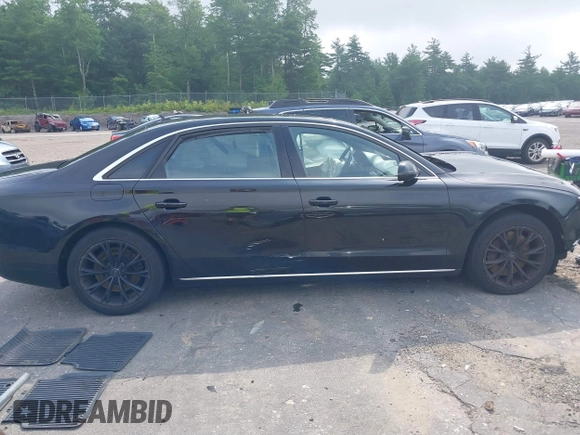 2012 Audi A8 with VIN WAURVAFDXCN017546, listed as a IAAI auction lot 39830968 with 123,089 mi miles and . Bid and sale history available at DreamBid. Image 14.