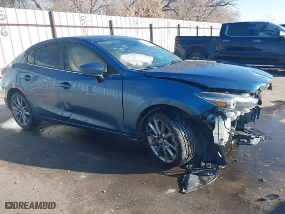 2018 Mazda Mazda3 4-Door Grand Touring with VIN 3MZBN1W38JM179689, listed as a IAAI auction lot 41305303 with 77,277 mi miles. Bid and sale history available at carsss.com. Image 1.
