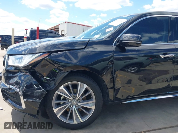 2017 Acura MDX Technology z VIN 5J8YD4H50HL007170, wystawiony jako IAAI lot #42220982 z przebiegiem 102 686 mil mil oraz . Historia ofert i sprzedaży dostępna na DreamBid. Obrazek 6.