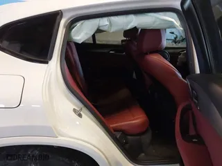 2019 BMW X4 xDrive30i with VIN 5UXUJ3C56KLG56553, listed as a IAAI auction lot 41365333 with 77,727 mi miles. Bid and sale history available at carsss.com. Image 8.
