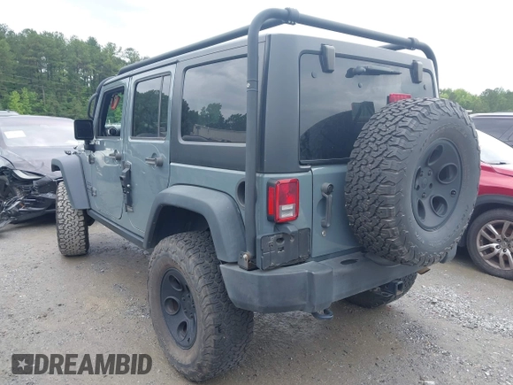 2015 Jeep Wrangler Unlimited Sport with VIN 1C4HJWDG1FL635620, listed as a IAAI auction lot 42396137 with 87,352 mi miles and . Bid and sale history available at DreamBid. Image 3.
