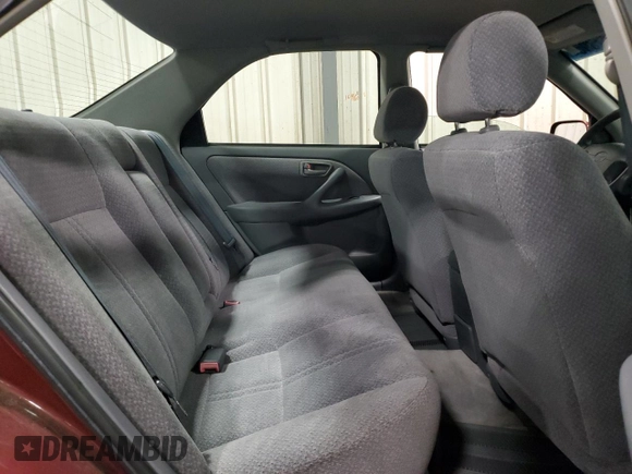 2000 Toyota Camry CE z VIN 4T1BG22K2YU938855, wystawiony jako Copart lot #56047305 z przebiegiem 129 096 mil mil oraz Szkoda całkowita • Salvage title. Historia ofert i sprzedaży dostępna na DreamBid. Obrazek 10.