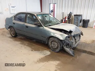 1998 Honda Civic DX with VIN JHMEJ6622WS000401, listed as a IAAI auction lot 41588057 with 296,638 mi miles. Bid and sale history available at carsss.com. Image 1.
