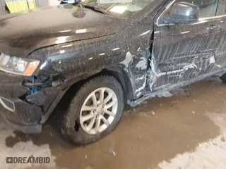 2015 Jeep Grand Cherokee Altitude with VIN 1C4RJFAG6FC652583, listed as a IAAI auction lot 41407149 with 168,413 mi miles. Bid and sale history available at carsss.com. Image 6.