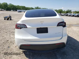 2023 Tesla Model Y Long Range with VIN 7SAYGDEE6PF861451, listed as a Copart auction lot 53133854 with 7,216 mi miles and Salvage Title. Bid and sale history available at DreamBid. Image 6.