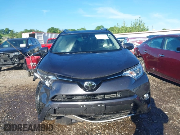 2018 Toyota RAV4 XLE z VIN JTMWFREV1JJ197662, wystawiony jako IAAI lot #42167382 z przebiegiem 64 826 mil mil oraz . Historia ofert i sprzedaży dostępna na DreamBid. Obrazek 12.