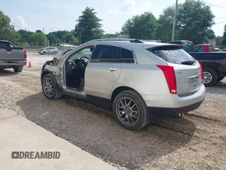 2015 Cadillac SRX Premium Collection with VIN 3GYFNDE36FS610650, listed as a IAAI auction lot 42286525 with 79,412 mi miles and . Bid and sale history available at DreamBid. Image 3.