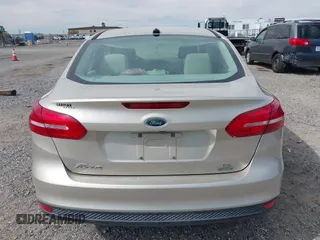 2018 Ford Focus SE with VIN 1FADP3FE7JL230870, listed as a IAAI auction lot 42021541 with 84,000 mi miles. Bid and sale history available at carsss.com. Image 16.