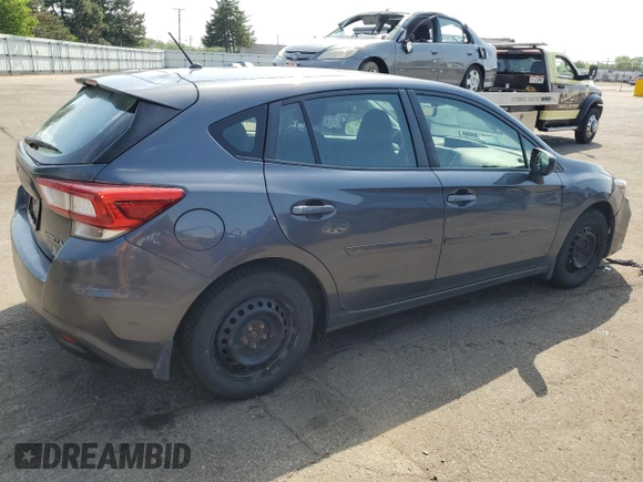 2019 Subaru Impreza with VIN 4S3GTAB6XK3719173, listed as a Copart auction lot 55141795 with 74,894 mi miles and Salvage title. Bid and sale history available at DreamBid. Image 3.