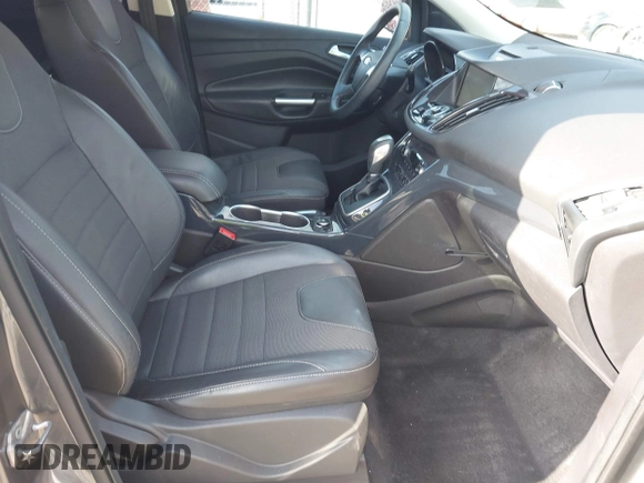 2013 Ford Escape Titanium with VIN 1FMCU0J96DUC31879, listed as a IAAI auction lot 42637019 with 66,096 mi miles and . Bid and sale history available at DreamBid. Image 5.