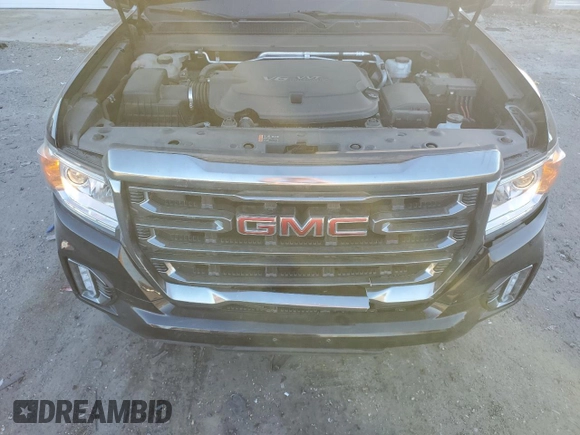 2021 GMC Canyon 4WD AT4 w/Cloth with VIN 1GTG6FEN5M1100096, listed as a Copart auction lot 77535584 with 25,152 mi miles and Salvage Title. Bid and sale history available at carsss.com. Image 11.