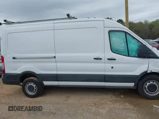 2019 Ford Transit z VIN 1FTYR2CM8KKA13993, wystawiony jako IAAI lot #41955116 z przebiegiem 91 395 mil mil oraz . Historia ofert i sprzedaży dostępna na DreamBid. Obrazek 13.