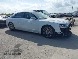 2015 Audi A8 L 4.0T with VIN WAU32AFD4FN002639, listed as a IAAI auction lot 41703951 with 103,722 mi miles. Bid and sale history available at carsss.com. Image 1.