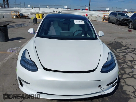 2020 Tesla Model 3 Standard Range Plus with VIN 5YJ3E1EA4LF805205, listed as a IAAI auction lot 41850744 with Not Provided miles. Bid and sale history available at carsss.com. Image 11.