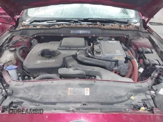 2014 Ford Fusion SE Hybrid with VIN 3FA6P0LU5ER136237, listed as a IAAI auction lot 41590088 with 174,009 mi miles. Bid and sale history available at carsss.com. Image 10.