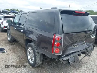 2011 GMC Yukon XL Denali with VIN 1GKS1MEF8BR279940, listed as a IAAI auction lot 41971157 with 218,597 mi miles. Bid and sale history available at carsss.com. Image 3.