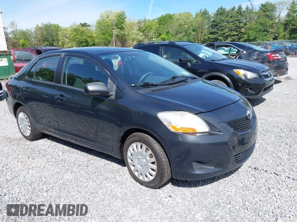 2009 Toyota Yaris z VIN JTDBT903094048800, wystawiony jako IAAI lot #42375049 z przebiegiem 168 478 mil mil oraz . Historia ofert i sprzedaży dostępna na DreamBid. Obrazek 1.