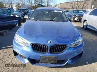 2016 BMW 2 Series M235i xDrive with VIN WBA1J9C55GV371825, listed as a Copart auction lot 42714675 with 86,108 mi miles and Salvage Title. Bid and sale history available at carsss.com. Image 5.
