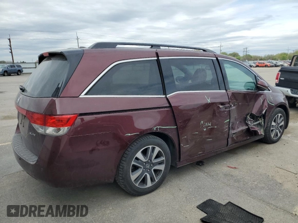 2016 Honda Odyssey Touring Elite with VIN 5FNRL5H96GB125546, listed as a Copart auction lot 54954165 with 101,479 mi miles and Salvage Title. Bid and sale history available at DreamBid. Image 3.