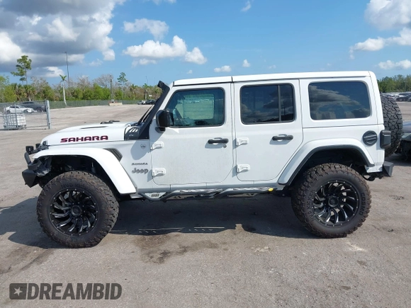 2020 Jeep Wrangler Unlimited Sahara with VIN 1C4HJXEN7LW213459, listed as a IAAI auction lot 41502047 with 40,816 mi miles. Bid and sale history available at carsss.com. Image 14.