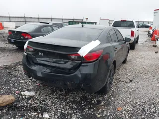 2014 Mazda 6 i Grand Touring with VIN JM1GJ1W69E1113895, listed as a IAAI auction lot 41953544 with 105,103 mi miles. Bid and sale history available at carsss.com. Image 4.