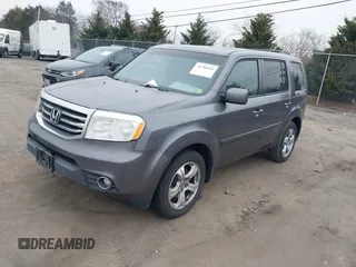 2015 Honda Pilot EX-L with VIN 5FNYF4H57FB035864, listed as a IAAI auction lot 41786445 with 139,787 mi miles and . Bid and sale history available at carsss.com. Image 2.