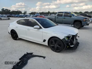 2023 Genesis G70 2.0T with VIN KMTG34TA4PU104576, listed as a Copart auction lot 85082044 with 28,821 mi miles and Salvage Title. Bid and sale history available at DreamBid. Image 4.