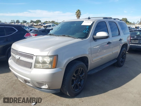 2007 Chevrolet Tahoe LTZ with VIN 1GNFC13077J399911, listed as a IAAI auction lot 41141878 with Not provided miles and . Bid and sale history available at DreamBid. Image 16.