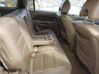 2007 Honda Pilot EX-L with VIN 5FNYF28517B002591, listed as a IAAI auction lot 41760295 with 204,533 mi miles. Bid and sale history available at carsss.com. Image 8.