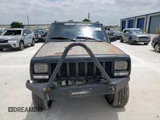 1998 Jeep Cherokee Sport z VIN 1J4FJ68S8WL193483, wystawiony jako Copart lot #58368705 z przebiegiem 94 462 mil mil oraz Szkoda całkowita • Salvage title. Historia ofert i sprzedaży dostępna na DreamBid. Obrazek 5.