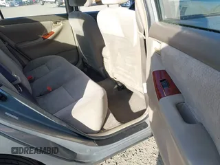 2004 Toyota Corolla CE with VIN JTDBR38E842043849, listed as a IAAI auction lot 41703290 with 299,999 mi miles. Bid and sale history available at carsss.com. Image 8.