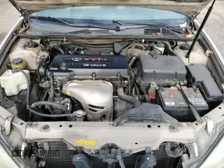 2002 Toyota Camry LE z VIN 4T1BE32K92U524457, wystawiony jako Copart lot #56864365 z przebiegiem 274 760 mil mil oraz Czysty tytuł • Clean title. Historia ofert i sprzedaży dostępna na DreamBid. Obrazek 11.
