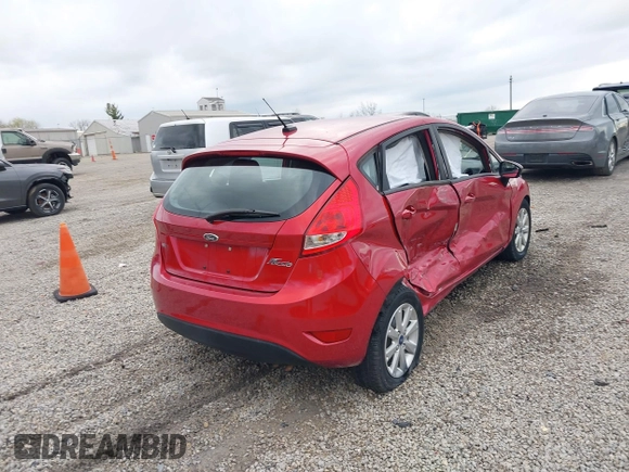 2011 Ford Fiesta SE with VIN 3FADP4EJ9BM216456, listed as a IAAI auction lot 41918530 with 165,989 mi miles. Bid and sale history available at carsss.com. Image 4.