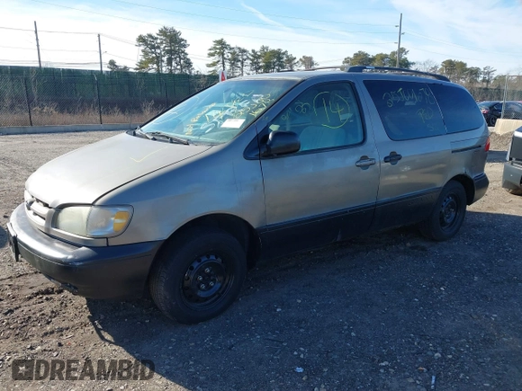 1999 Toyota Sienna LE with VIN 4T3ZF13CXXU121819, listed as a IAAI auction lot 41607624 with 999,999 mi miles. Bid and sale history available at carsss.com. Image 2.