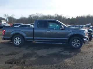 2018 Ford F-150 XL with VIN 1FTEX1EP7JFA75693, listed as a IAAI auction lot 41308249 with 75,747 mi miles and . Bid and sale history available at DreamBid. Image 13.