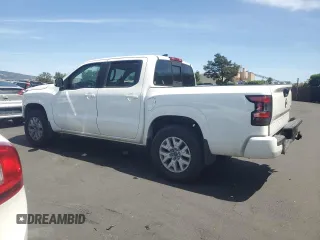 2022 Nissan Frontier Pro-4X with VIN 1N6ED1EKXNN674402, listed as a Copart auction lot 57417245 with 13,986 mi miles and Salvage title. Bid and sale history available at DreamBid. Image 2.