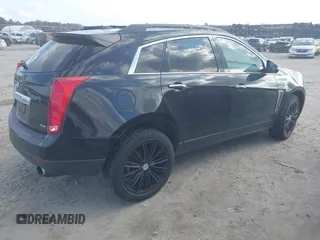 2014 Cadillac SRX z VIN 3GYFNAE35ES652370, wystawiony jako IAAI lot #40984924 z przebiegiem 211 588 mil mil oraz . Historia ofert i sprzedaży dostępna na DreamBid. Obrazek 4.