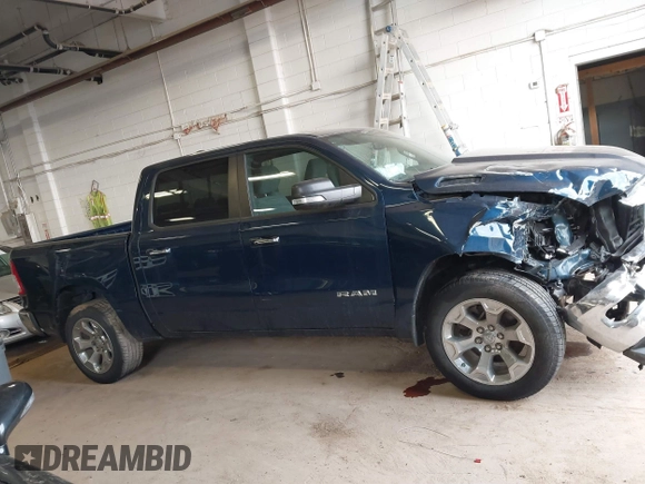 2019 Ram 1500 Big Horn z VIN 1C6SRFFT5KN762580, wystawiony jako IAAI lot #41858654 z przebiegiem 57 801 mil mil oraz . Historia ofert i sprzedaży dostępna na DreamBid. Obrazek 13.