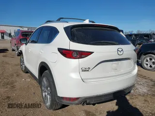 2020 Mazda CX-5 Grand Touring with VIN JM3KFADM5L1815374, listed as a IAAI auction lot 41416077 with 44,190 mi miles. Bid and sale history available at carsss.com. Image 3.