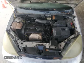 2004 Ford Focus ZX5 z VIN 3FAFP37394R122388, wystawiony jako Copart lot #45163225 z przebiegiem 259 554 mil mil oraz Czysty tytuł • Clean title. Historia ofert i sprzedaży dostępna na DreamBid. Obrazek 11.